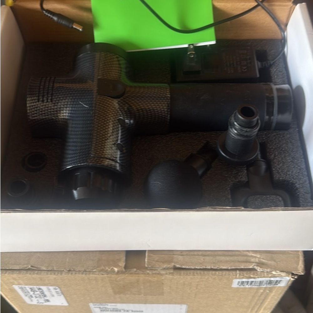 Black Massage Gun with Attachments